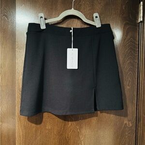 NWT. AMEI Black Skort (Skirt with shorts) with slit